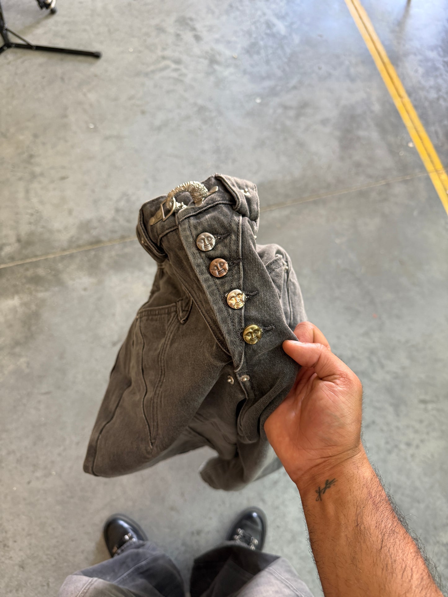 Them grey joints wit da clasp and buttons ong
